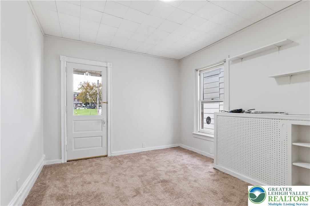 624 Cleveland Street Allentown, PA 18103 - Photo 13 of 35 a view of a kitchen with refrigerator and window