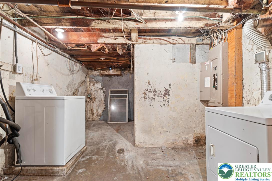 624 Cleveland Street Allentown, PA 18103 - Photo 29 of 35 a view of storage and utility room with a refrigerator