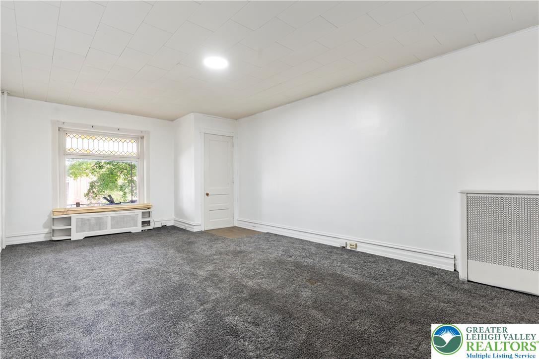 624 Cleveland Street Allentown, PA 18103 - Photo 3 of 35 an empty room with windows