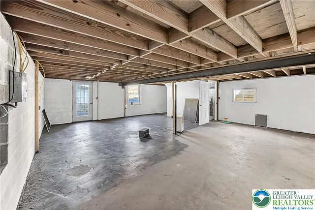 a view of a room with wooden walls