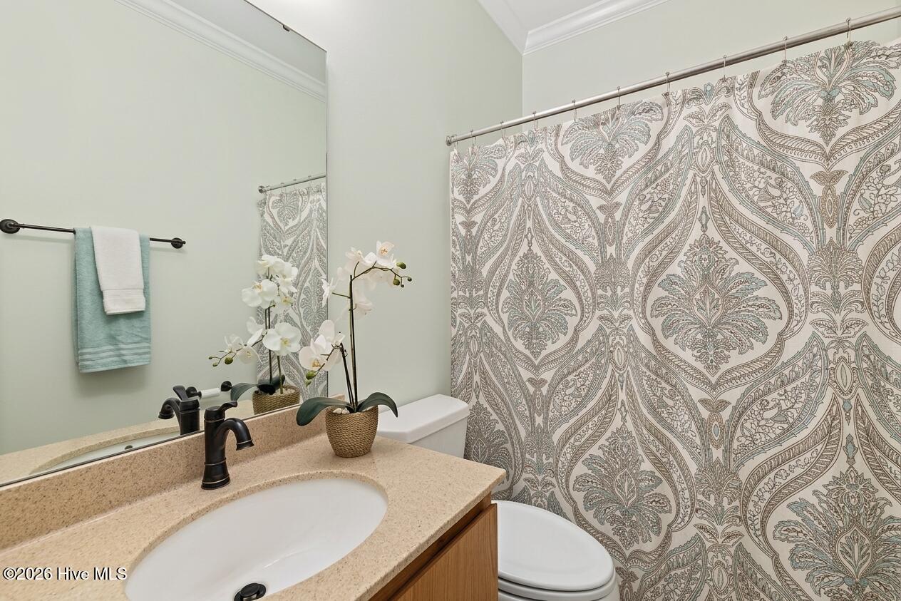 8407 Wycombe Lane Raleigh, NC 27615 - Photo 12 of 18 Solid surface vanity and tub shower combo