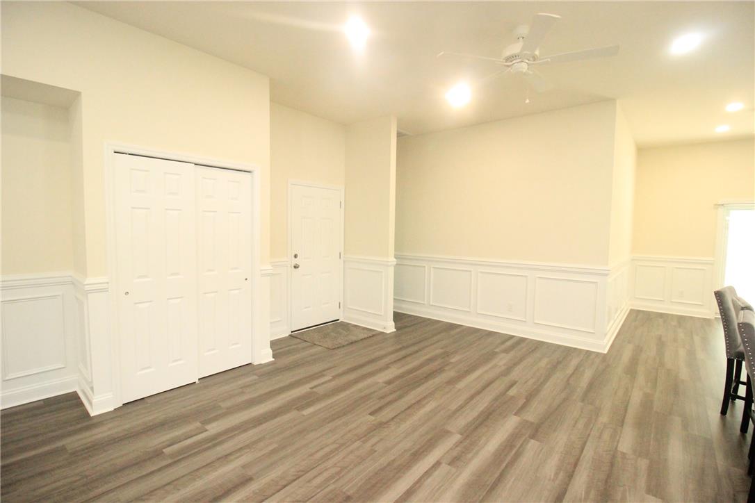 3083 Penn Allen Road, Unit B Nazareth, PA 18064 - Photo 5 of 21 A well-lit interior space features wainscoting and durable plank flooring.