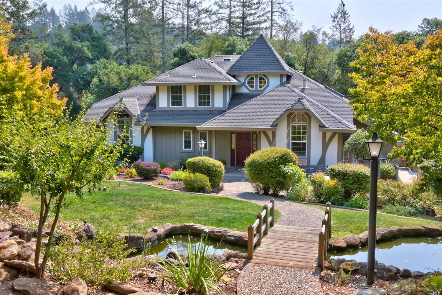 3450 Montecito Avenue Santa Rosa, CA 95404 - Photo 1 of 1 a front view of a house with a yard