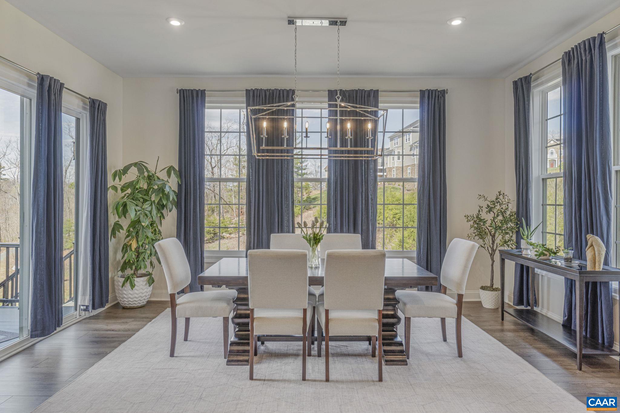 3624 Osprey Drive Keswick, VA 22947 - Photo 17 of 68 a view of a dining room with furniture window and outside view