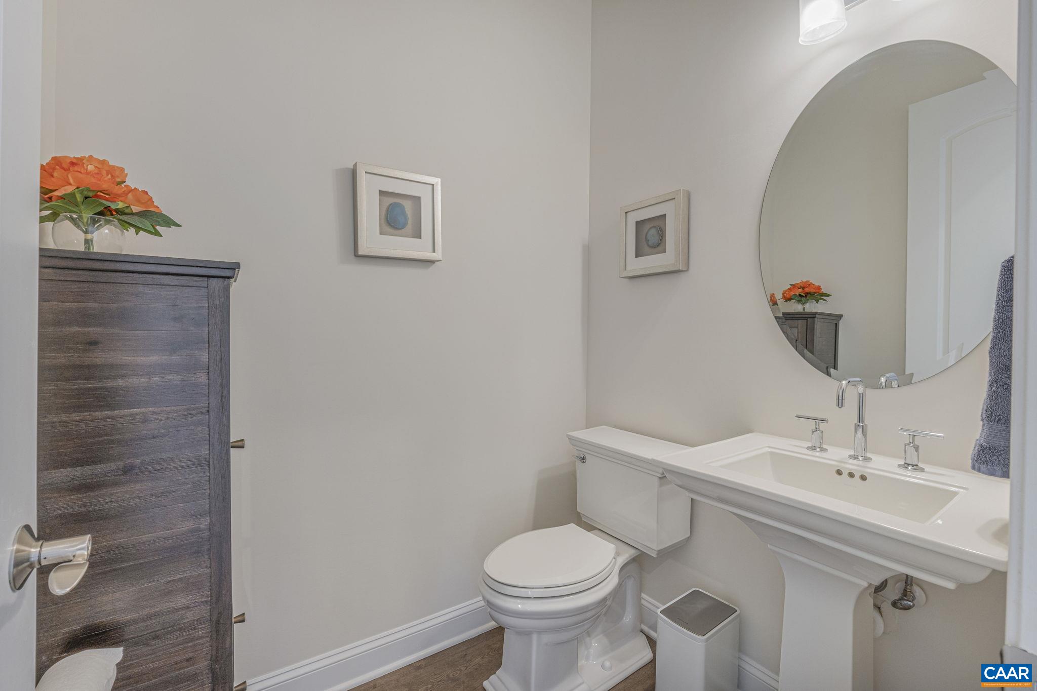3624 Osprey Drive Keswick, VA 22947 - Photo 27 of 68 a bathroom with a toilet sink and mirror