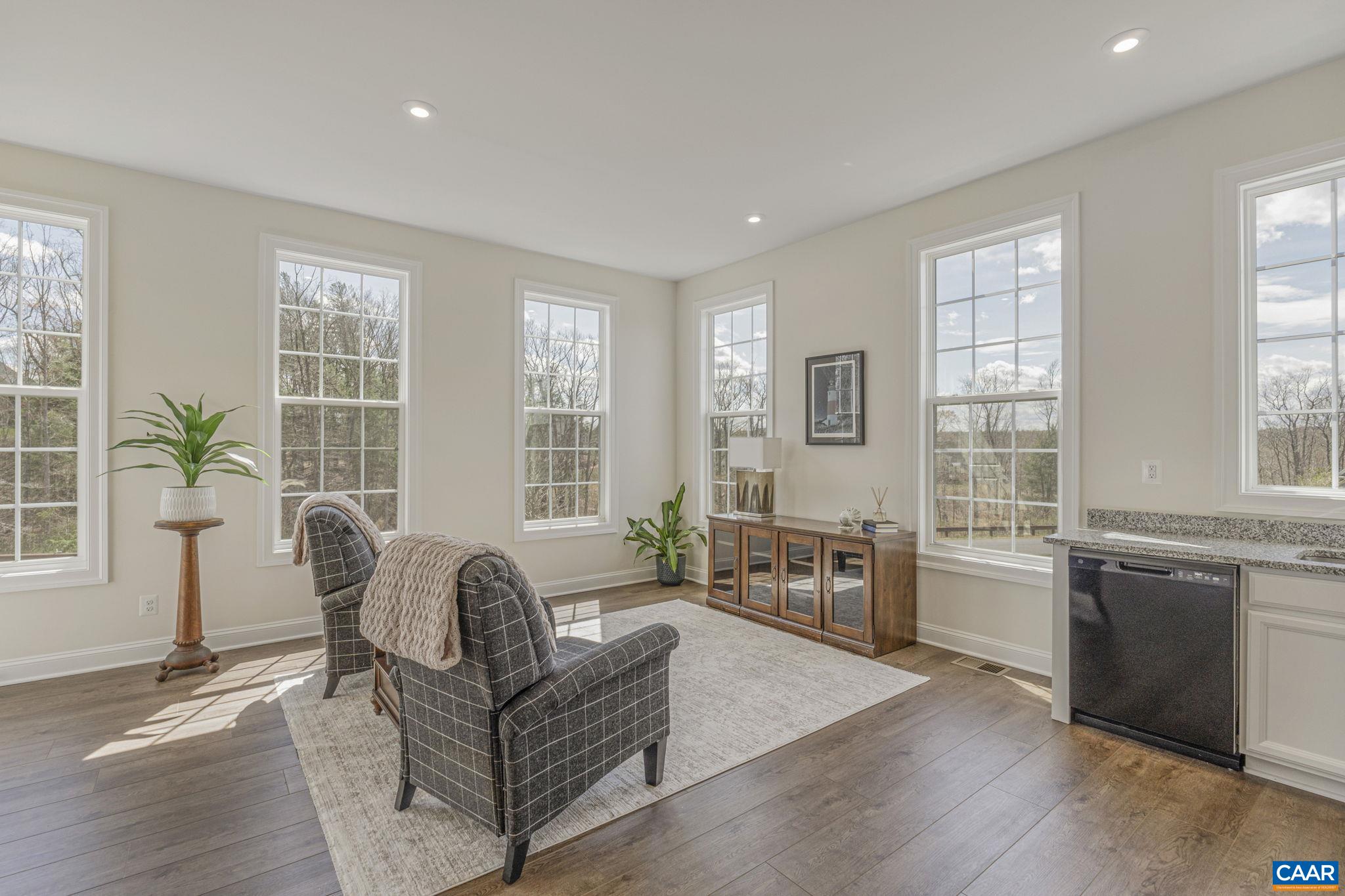 3624 Osprey Drive Keswick, VA 22947 - Photo 29 of 68 a living room with furniture and windows