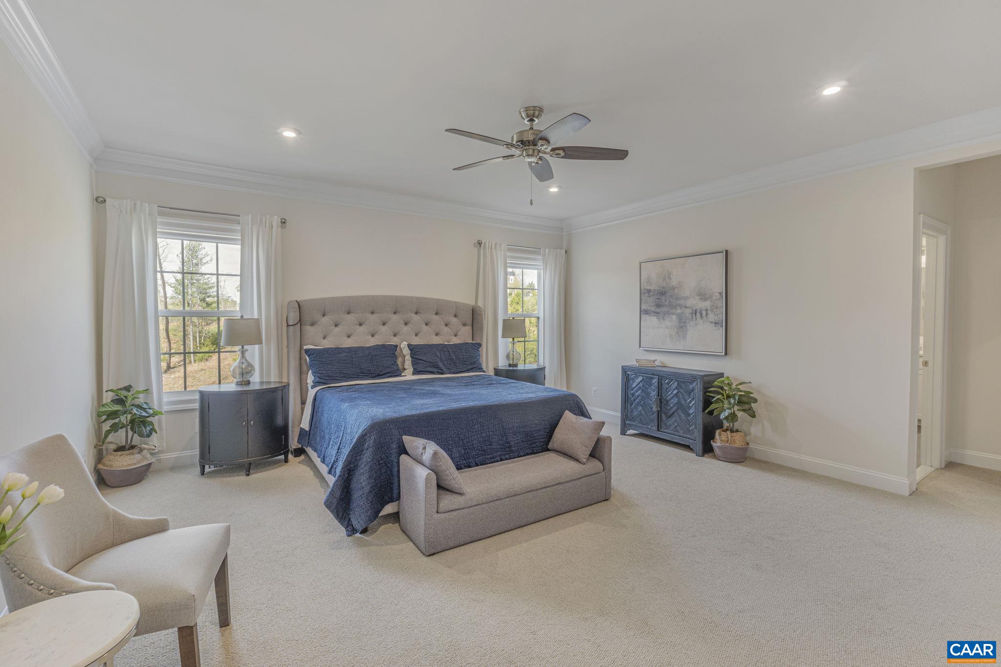 3624 Osprey Drive Keswick, VA 22947 - Photo 37 of 68 a bedroom with a bed and a couch