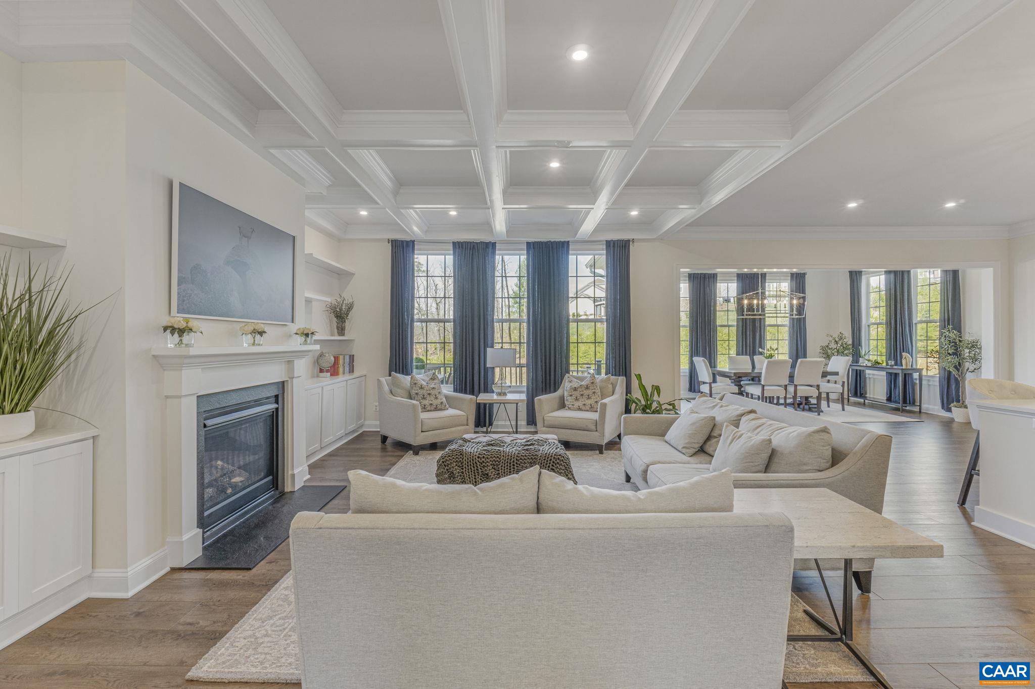 3624 Osprey Drive Keswick, VA 22947 - Photo 4 of 68 a living room with furniture fireplace and a large window