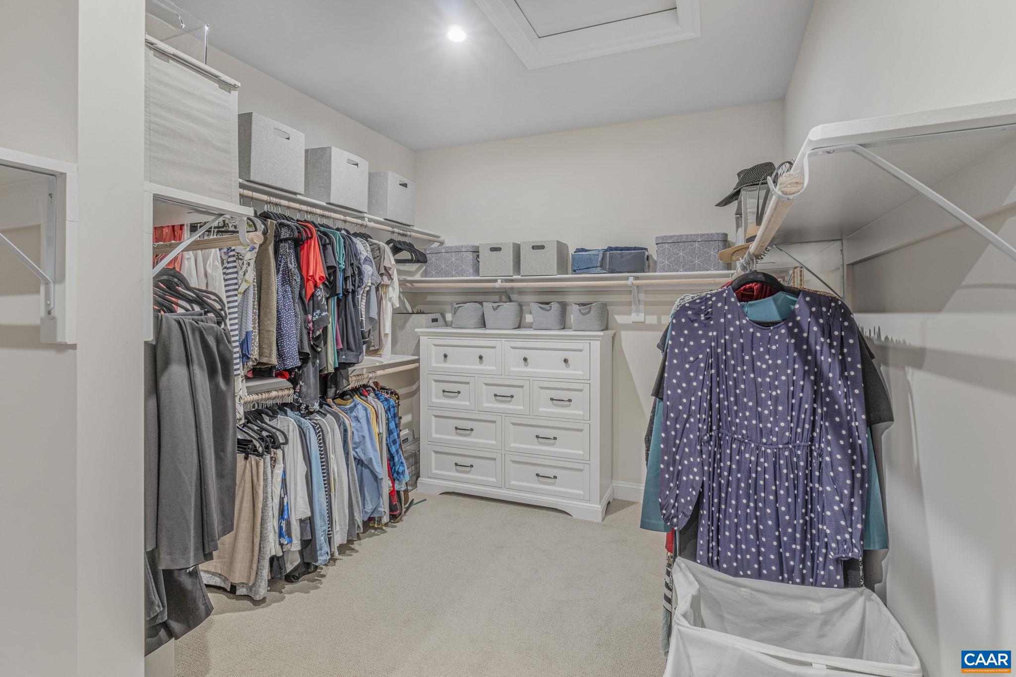 3624 Osprey Drive Keswick, VA 22947 - Photo 43 of 68 a view of walk in closet with clothes and shoes