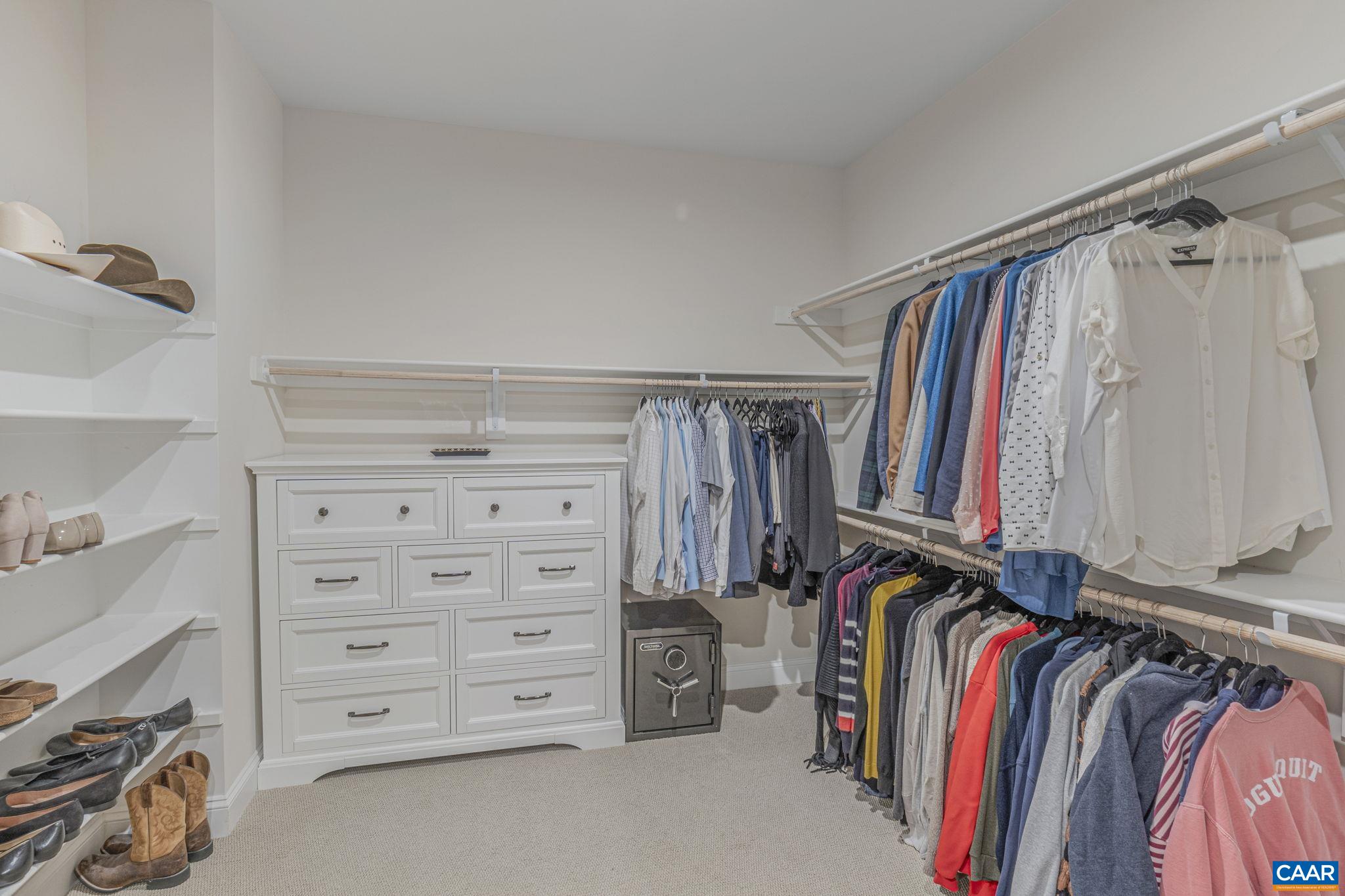 3624 Osprey Drive Keswick, VA 22947 - Photo 44 of 68 a view of walk in closet with clothes and shoes