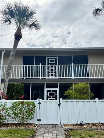 wooden floor in a hall with an entryway