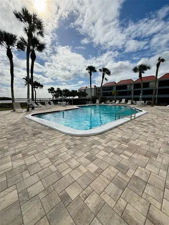 a kitchen with a stove and a refrigerator