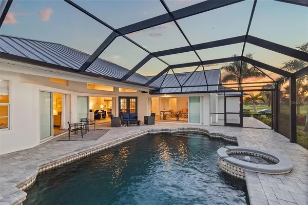 an aerial view of a house with a ocean view