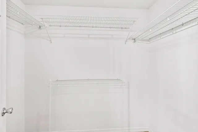 a view of a room with racks on the wall