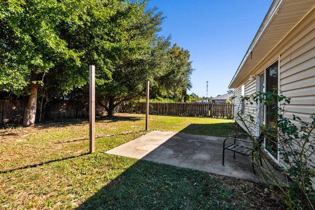 a house with trees in the background