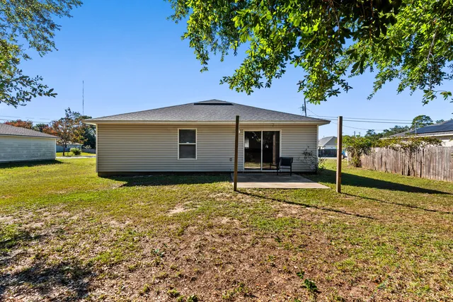a house with trees in front of it
