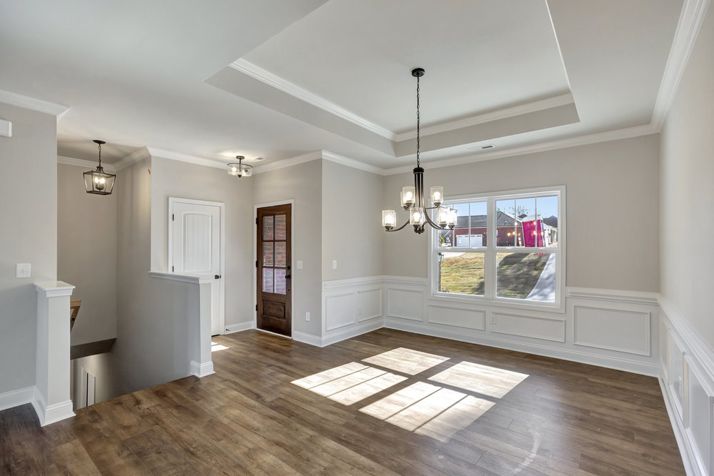 118 Bonaire Point Anderson, SC 29621 - Photo 23 of 23 This inviting space features classic hardwood floors and an elegant tray ceiling, perfect for daily living.