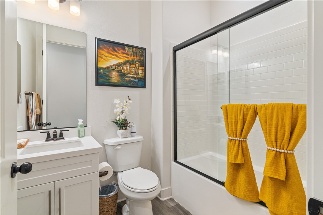 11523 Explorer Court Corona, CA 92883 - Photo 21 of 64 a bathroom with a sink and a mirror