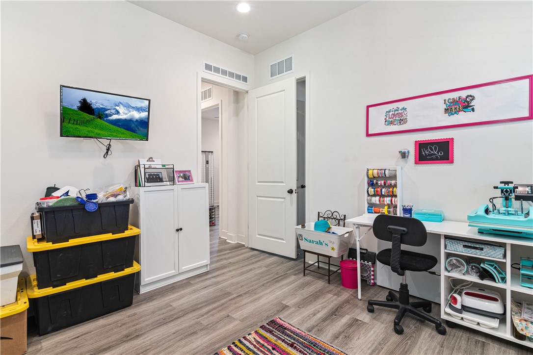 11523 Explorer Court Corona, CA 92883 - Photo 23 of 64 a room with furniture and wooden floor