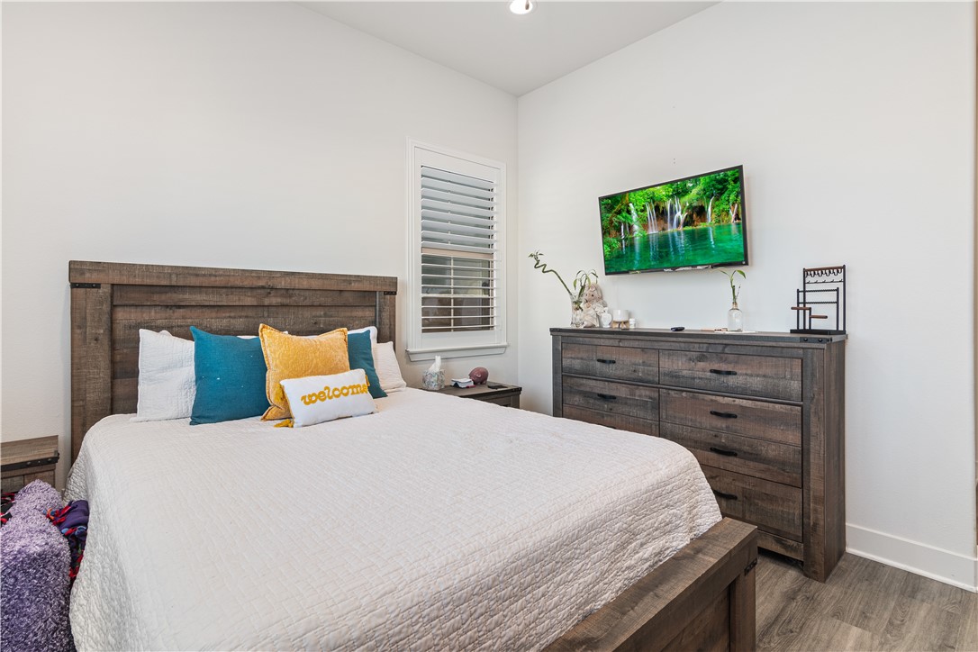 11523 Explorer Court Corona, CA 92883 - Photo 27 of 64 a bedroom with a bed and a window