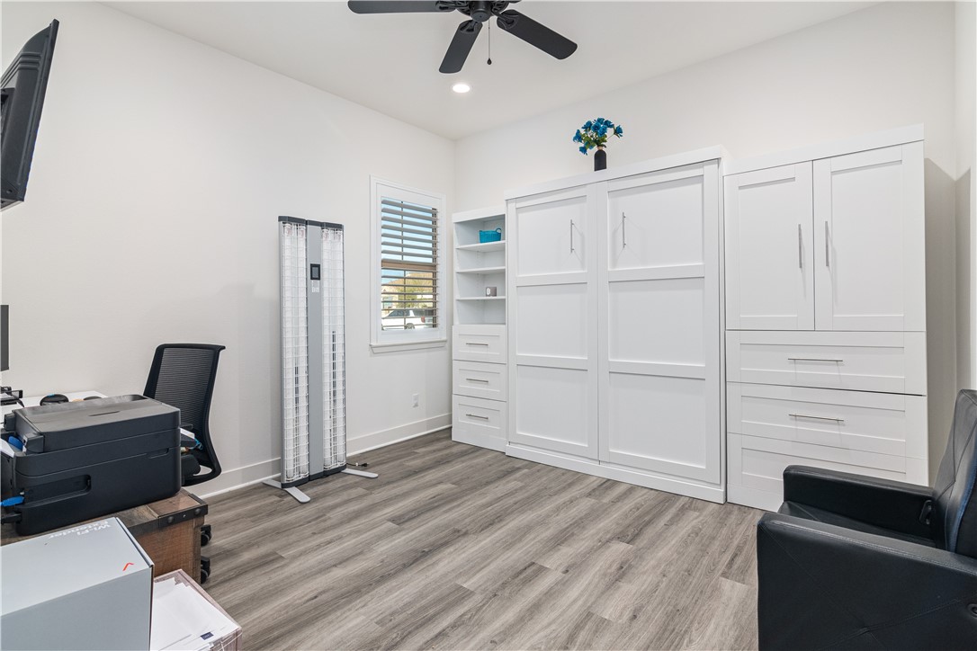11523 Explorer Court Corona, CA 92883 - Photo 28 of 64 a view of a workspace with furniture and wooden floor