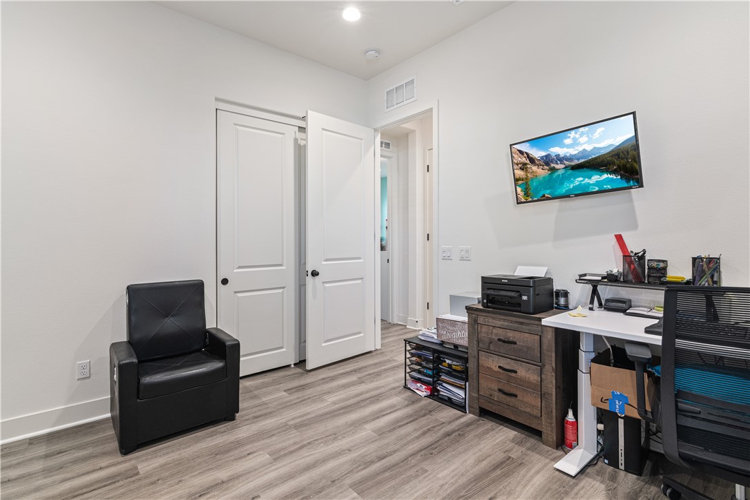 11523 Explorer Court Corona, CA 92883 - Photo 29 of 64 a view of a livingroom with furniture and wooden floor