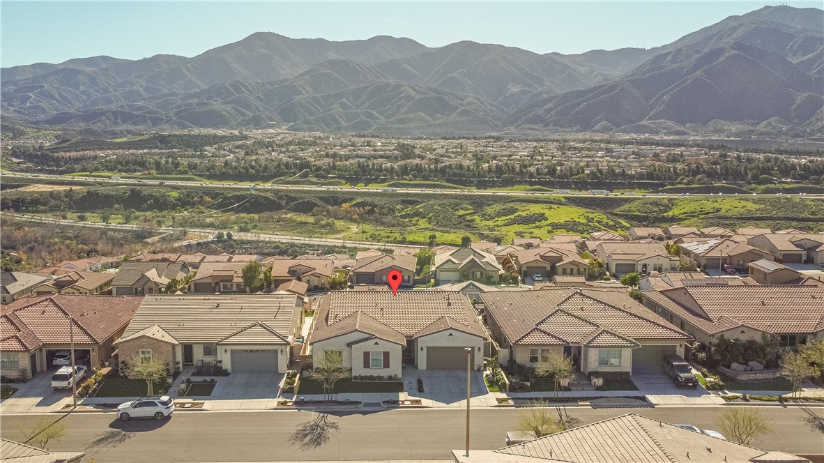 11523 Explorer Court Corona, CA 92883 - Photo 43 of 64 a view of a house with a mountain