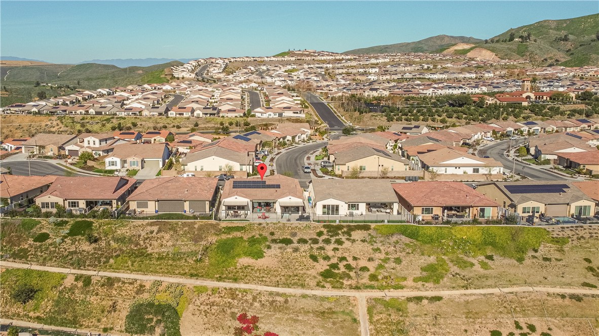 11523 Explorer Court Corona, CA 92883 - Photo 44 of 64 an aerial view of residential houses with outdoor space