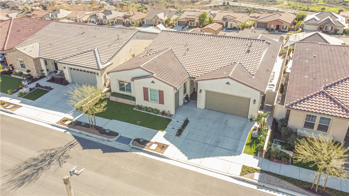 11523 Explorer Court Corona, CA 92883 - Photo 45 of 64 an aerial view of a house with a garden and entryway