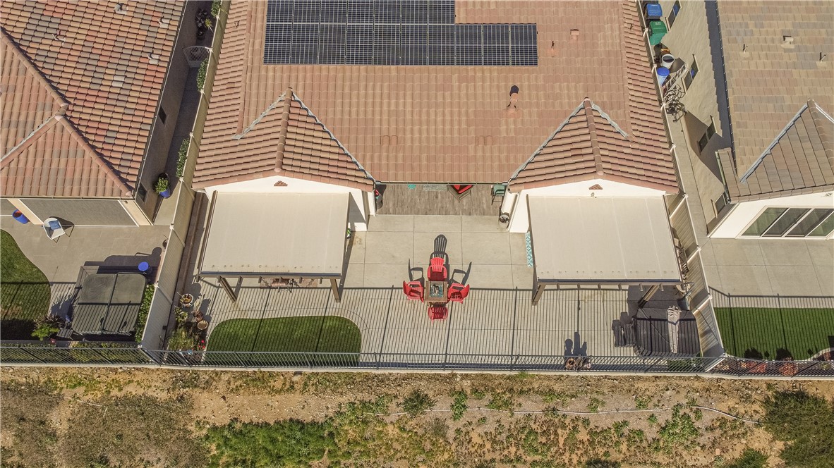 11523 Explorer Court Corona, CA 92883 - Photo 46 of 64 a view of a terrace with wooden fence