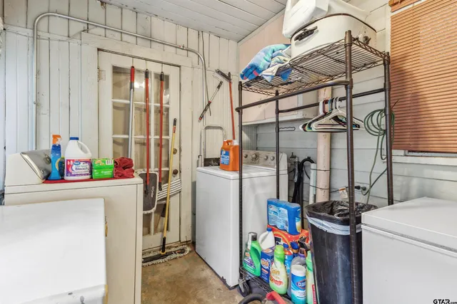 a utility room with dryer and washer