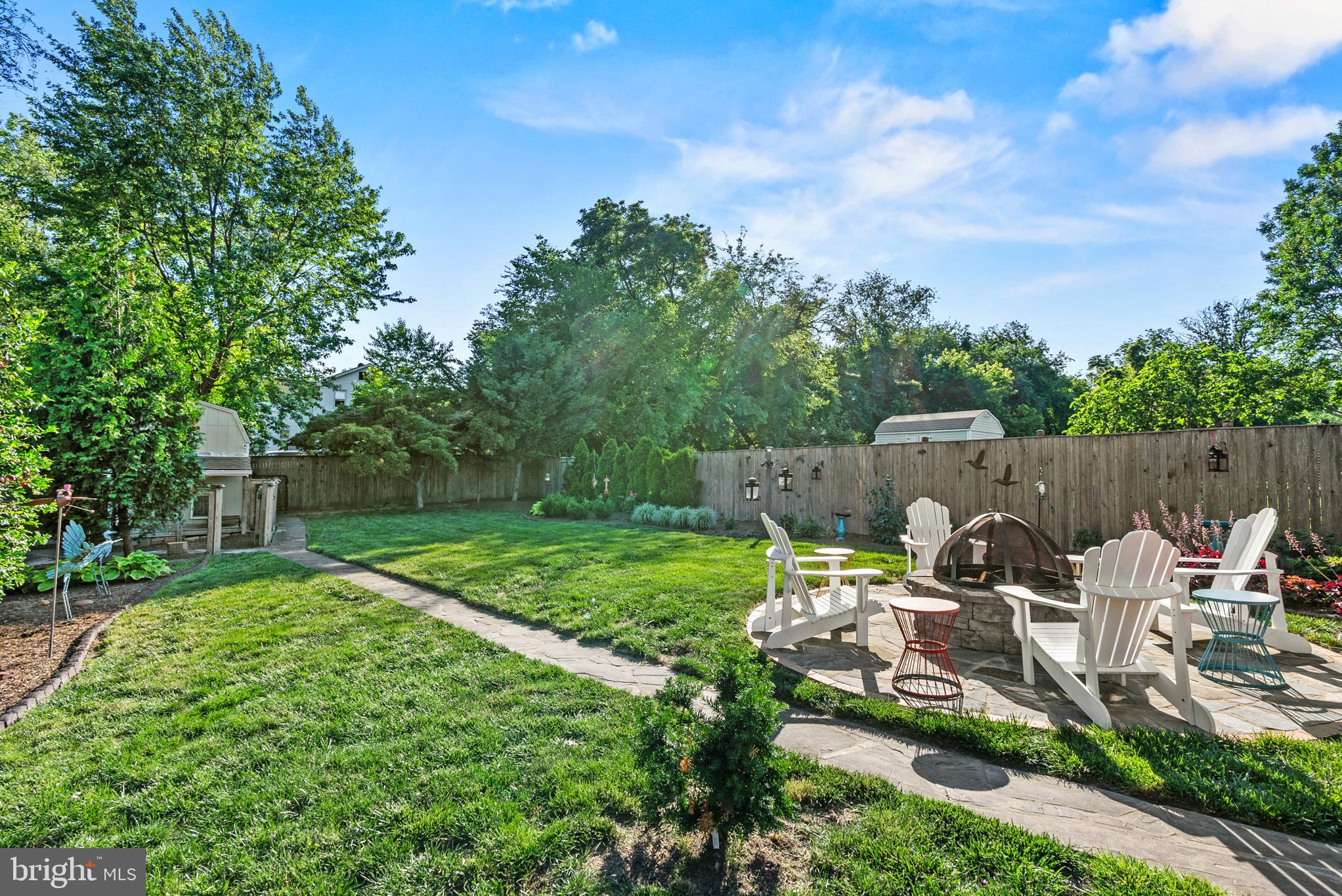 819 Chillum Road Hyattsville, MD 20783 - Photo 42 of 48 a backyard of a house with table and chairs