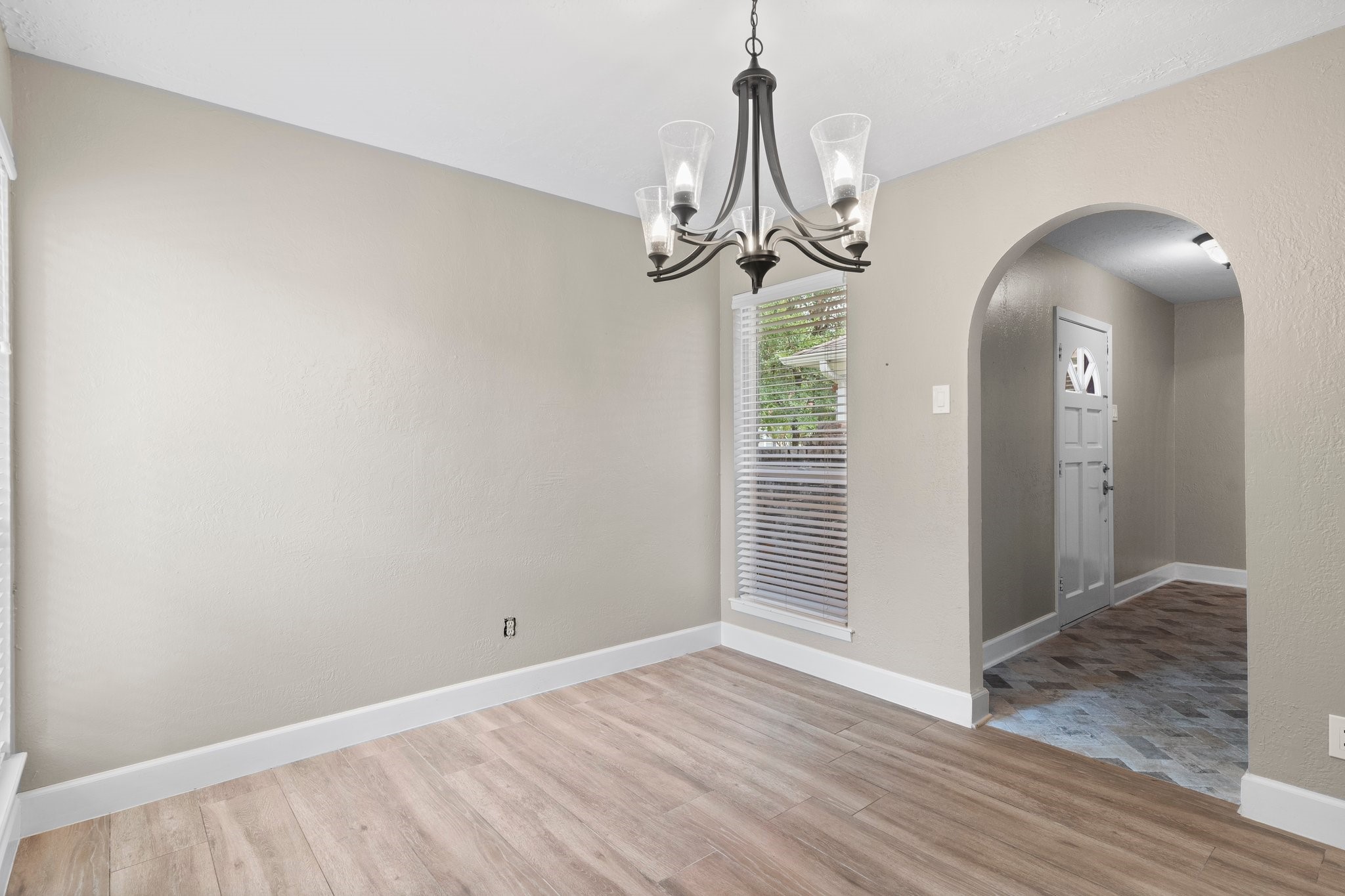 27234 Wells Lane Conroe, TX 77385 - Photo 13 of 15 a view of a room with wooden floor and stairs