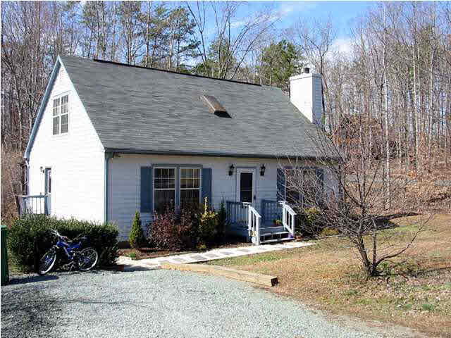 1 Tanglewood Road Palmyra, VA 22963 - Photo 7 of 7 a view of a house with a patio