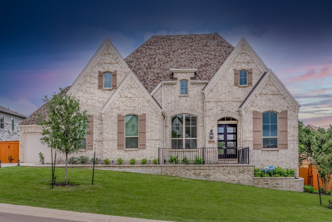 236 Egret Lane Austin, TX 78737 - Photo 1 of 1 front view of a house with a yard