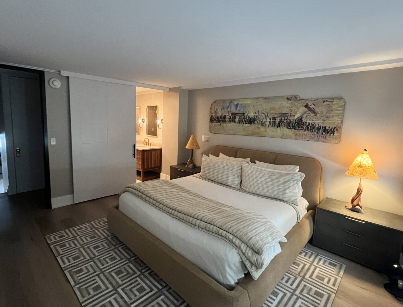 1630 Sheridan Road, Unit 2N Wilmette, IL 60091 - Photo 14 of 32 a bedroom with a bed and wooden floor