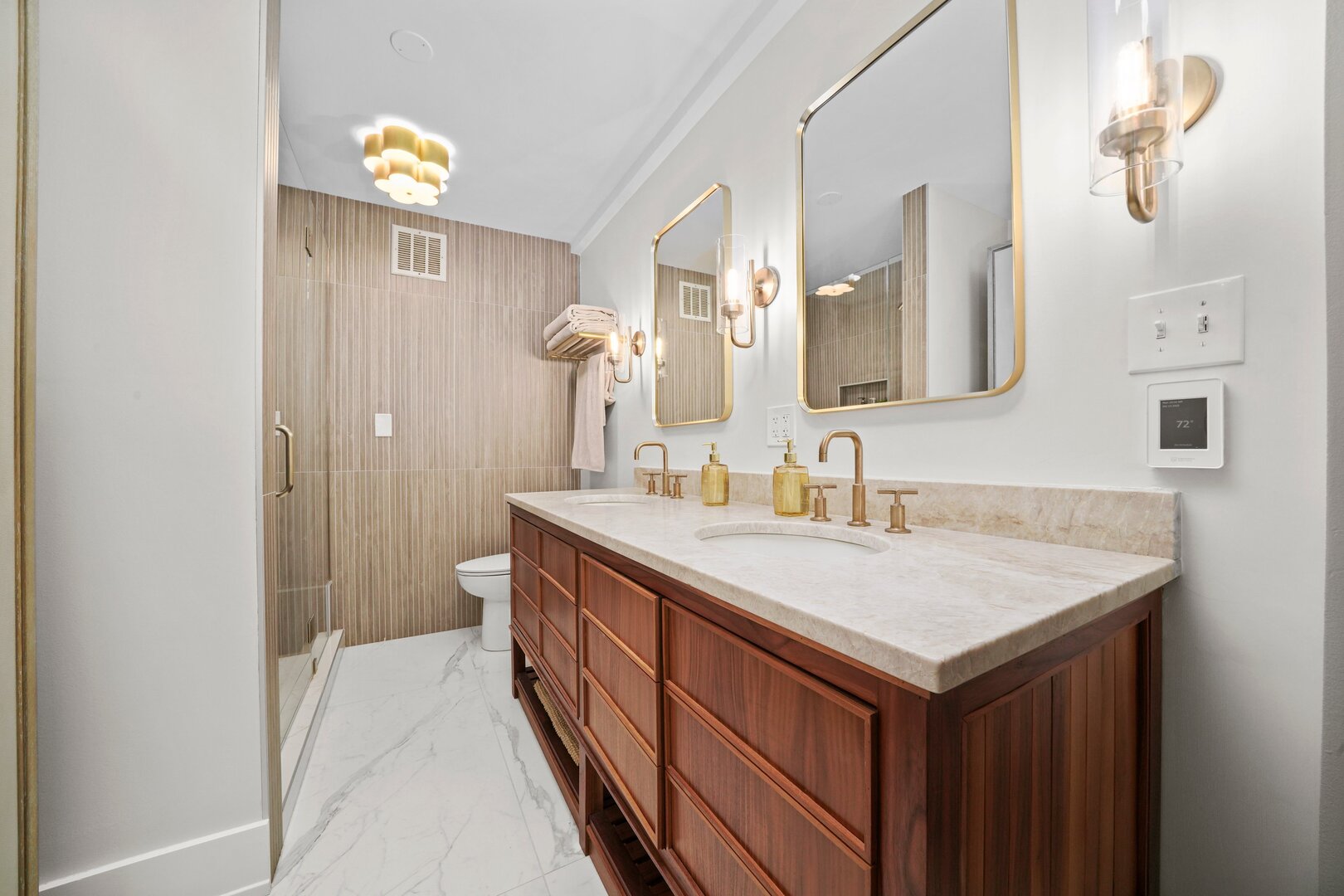 1630 Sheridan Road, Unit 2N Wilmette, IL 60091 - Photo 15 of 32 a bathroom with a sink and a mirror