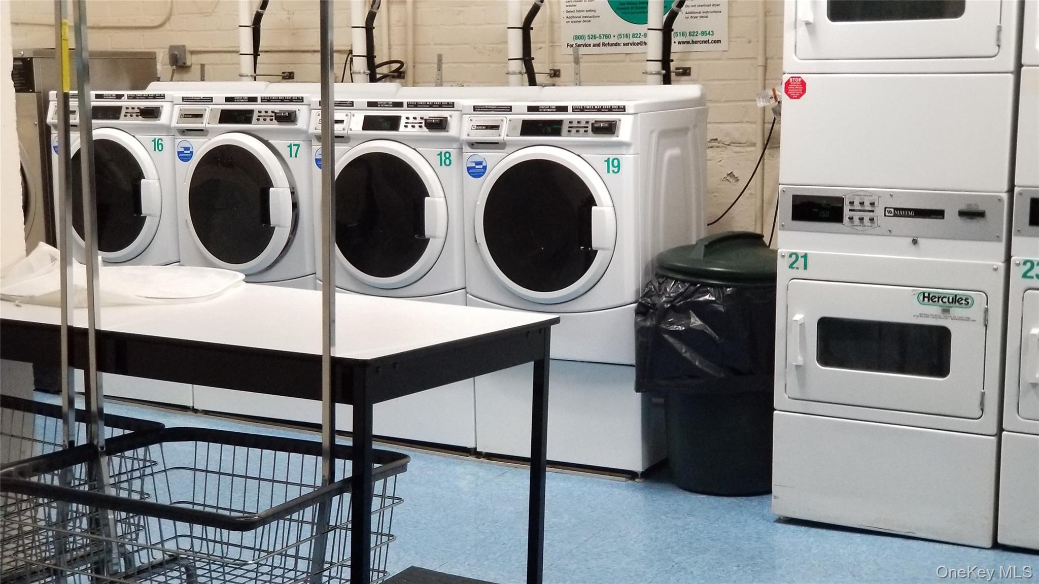 126 Church Street, Unit 2D New Rochelle, NY 10805 - Photo 11 of 15 Community laundry with estacked washer and dryer and independent washer and dryer