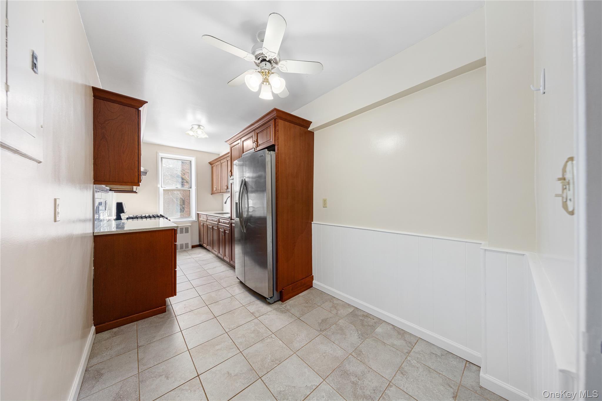 126 Church Street, Unit 2D New Rochelle, NY 10805 - Photo 16 of 32 a view of kitchen with stainless steel appliances a refrigerator and a sink