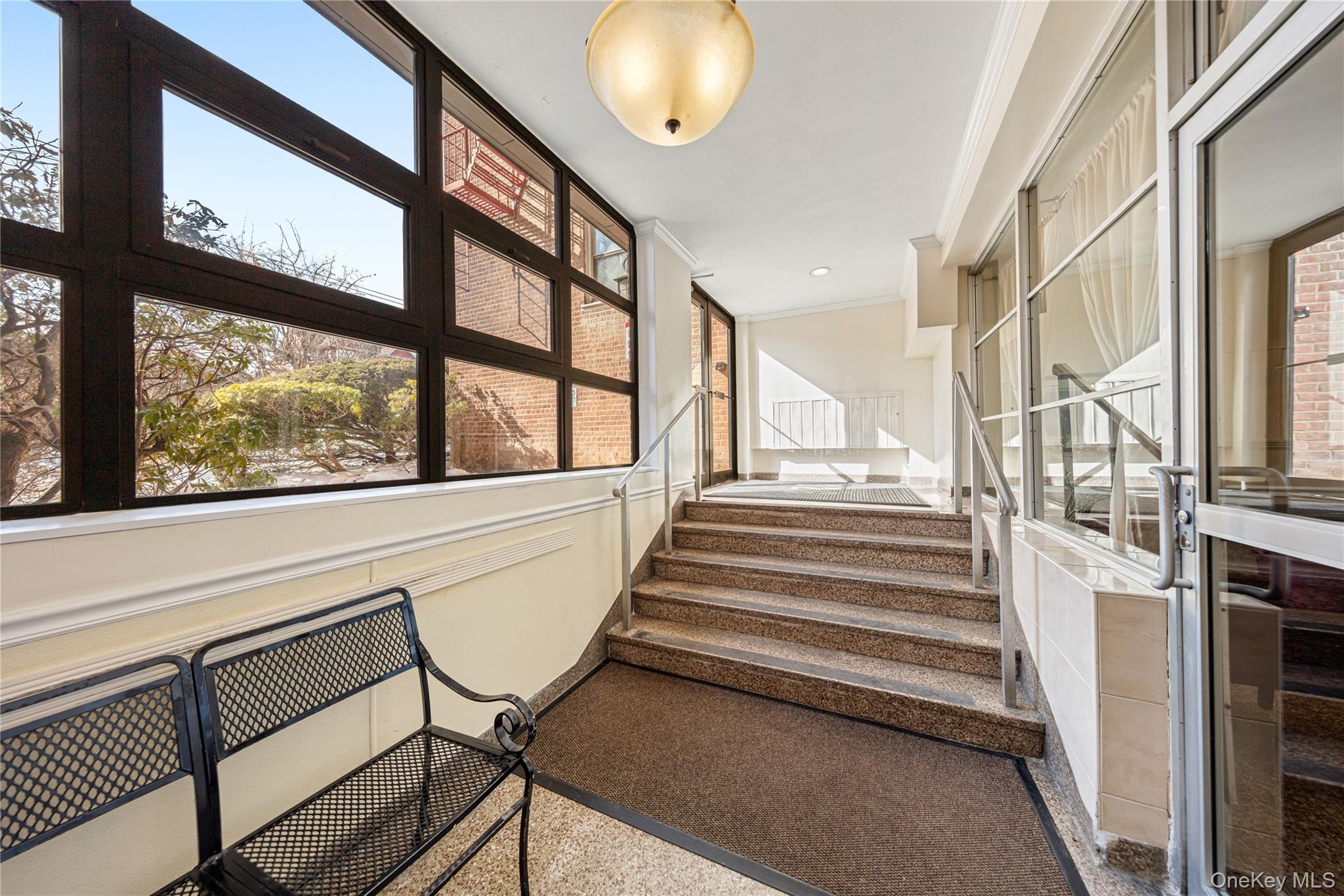 126 Church Street, Unit 2D New Rochelle, NY 10805 - Photo 26 of 32 a view of entryway and hall with wooden floor