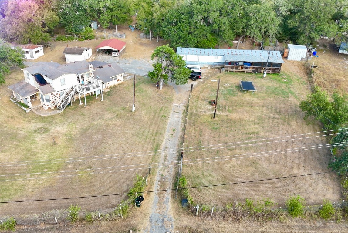 109 Wayside Drive Elgin, TX 78621 - Photo 2 of 31 a view of fountain in the backyard