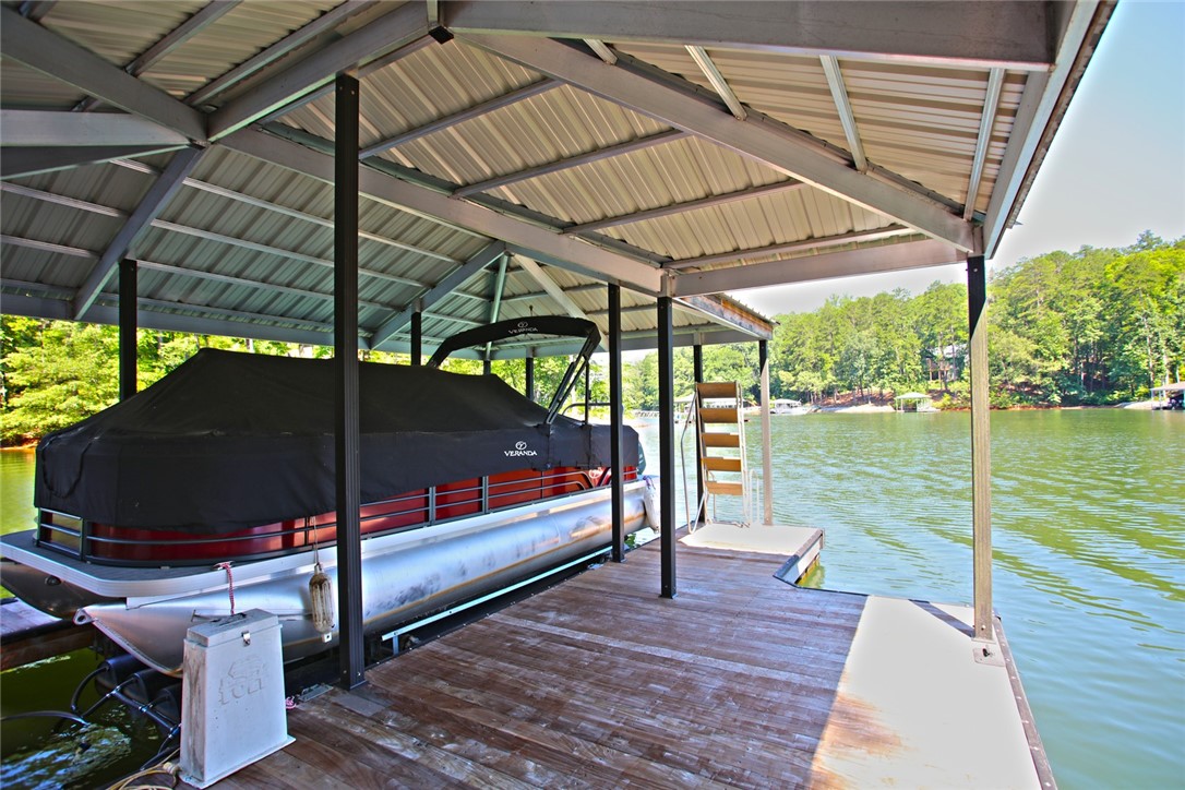 1359 Hbr Rdg Road Seneca, SC 29672 - Photo 23 of 39 A spacious boat dock with covered slip, ready for lake adventures.