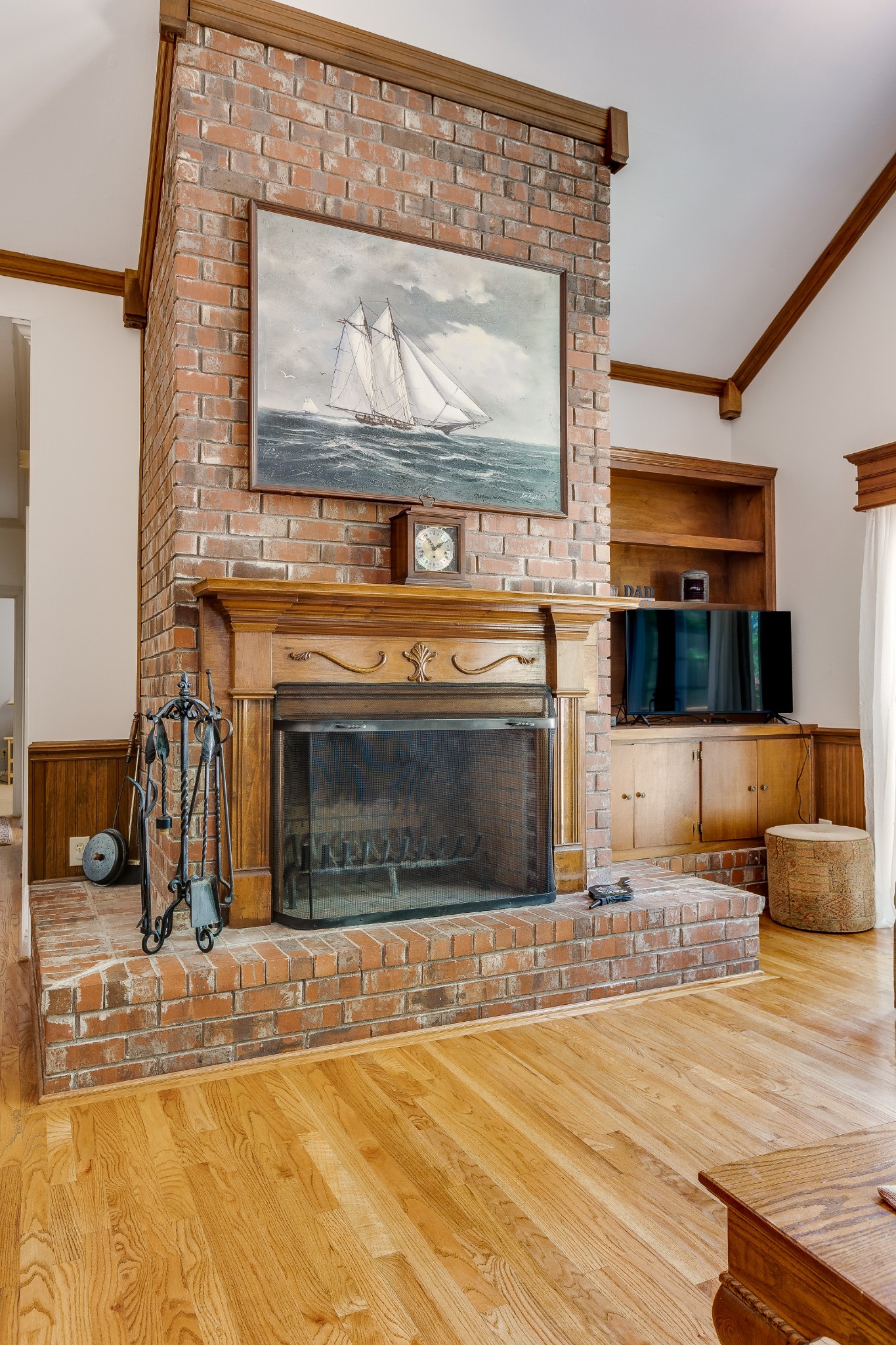 1111 Temple Ridge Court Nashville, TN 37221 - Photo 26 of 46 a view of a fireplace with a wooden floor