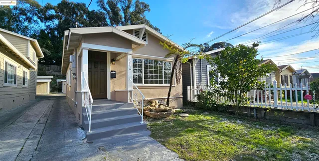 a view of house with yard outdoor seating and entertaining space