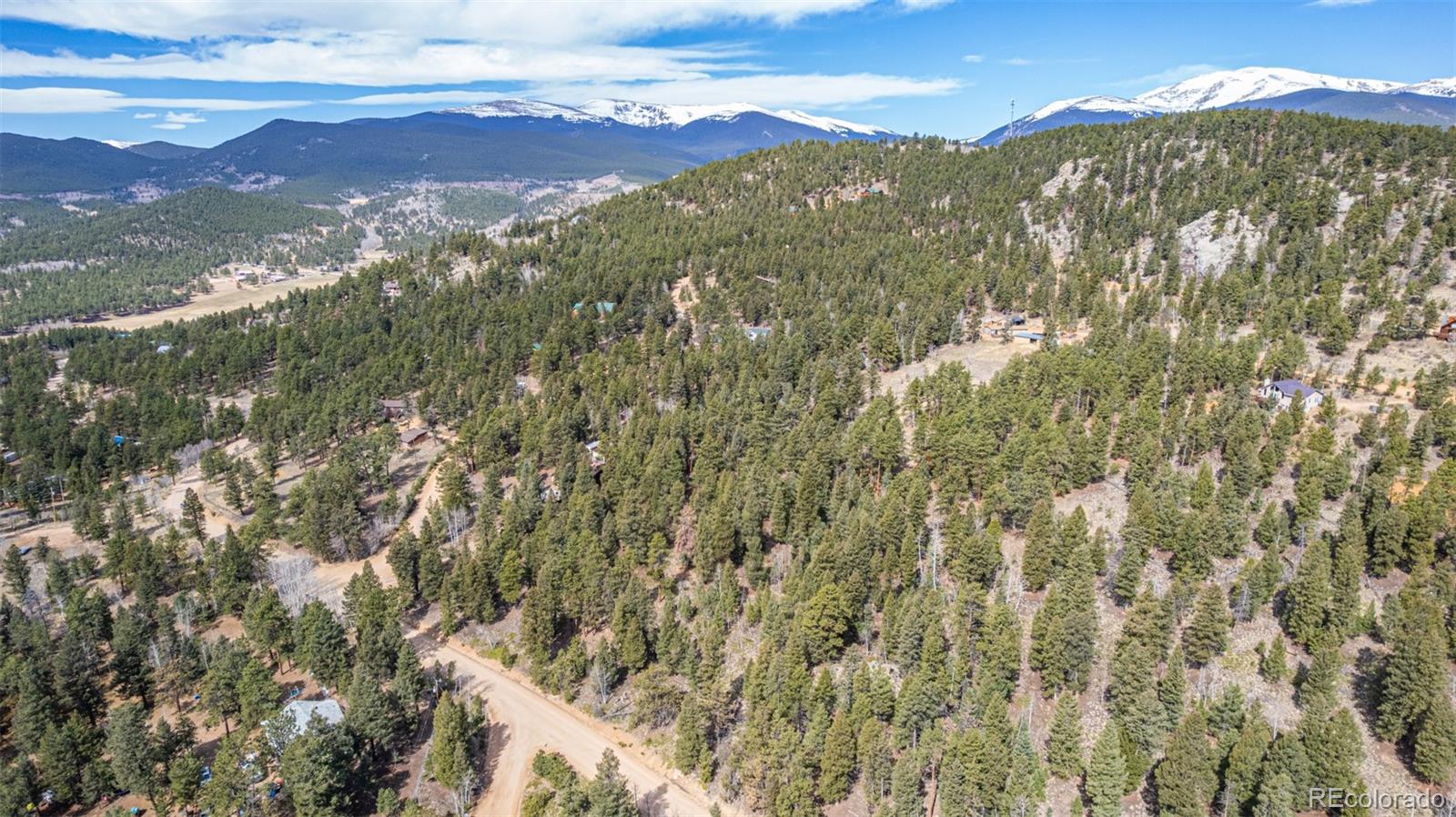 449 Forest Drive Bailey, CO 80421 - Photo 12 of 49 a view of a city with mountains in the background