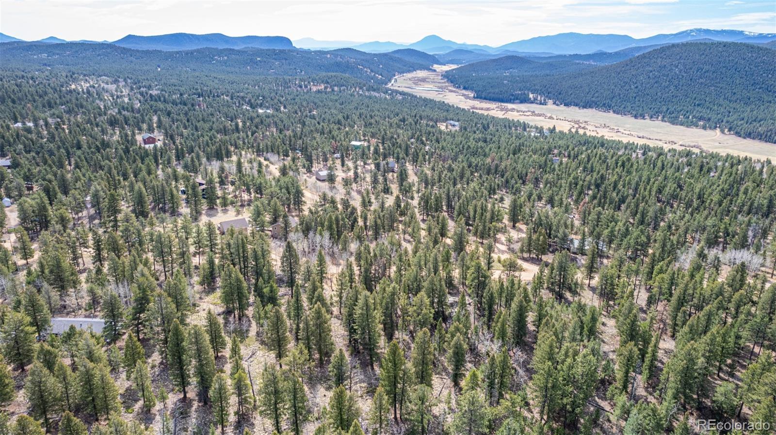 449 Forest Drive Bailey, CO 80421 - Photo 13 of 49 a view of a house with a mountain