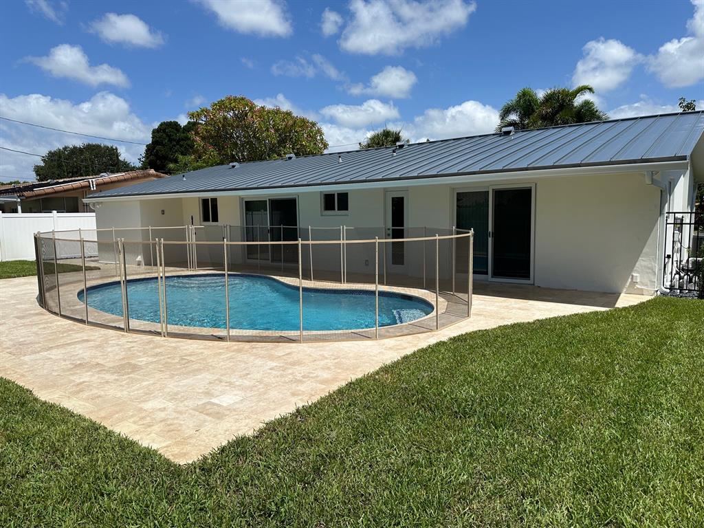 1600 Northeast 59th Place Fort Lauderdale, FL 33334 - Photo 2 of 2 a view of outdoor space yard and patio