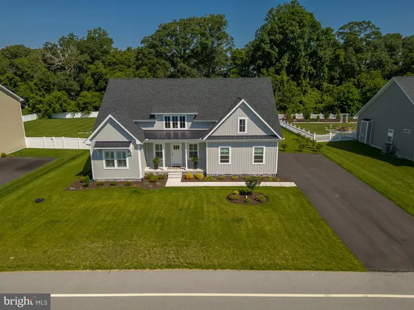 a aerial view of a house with swimming pool