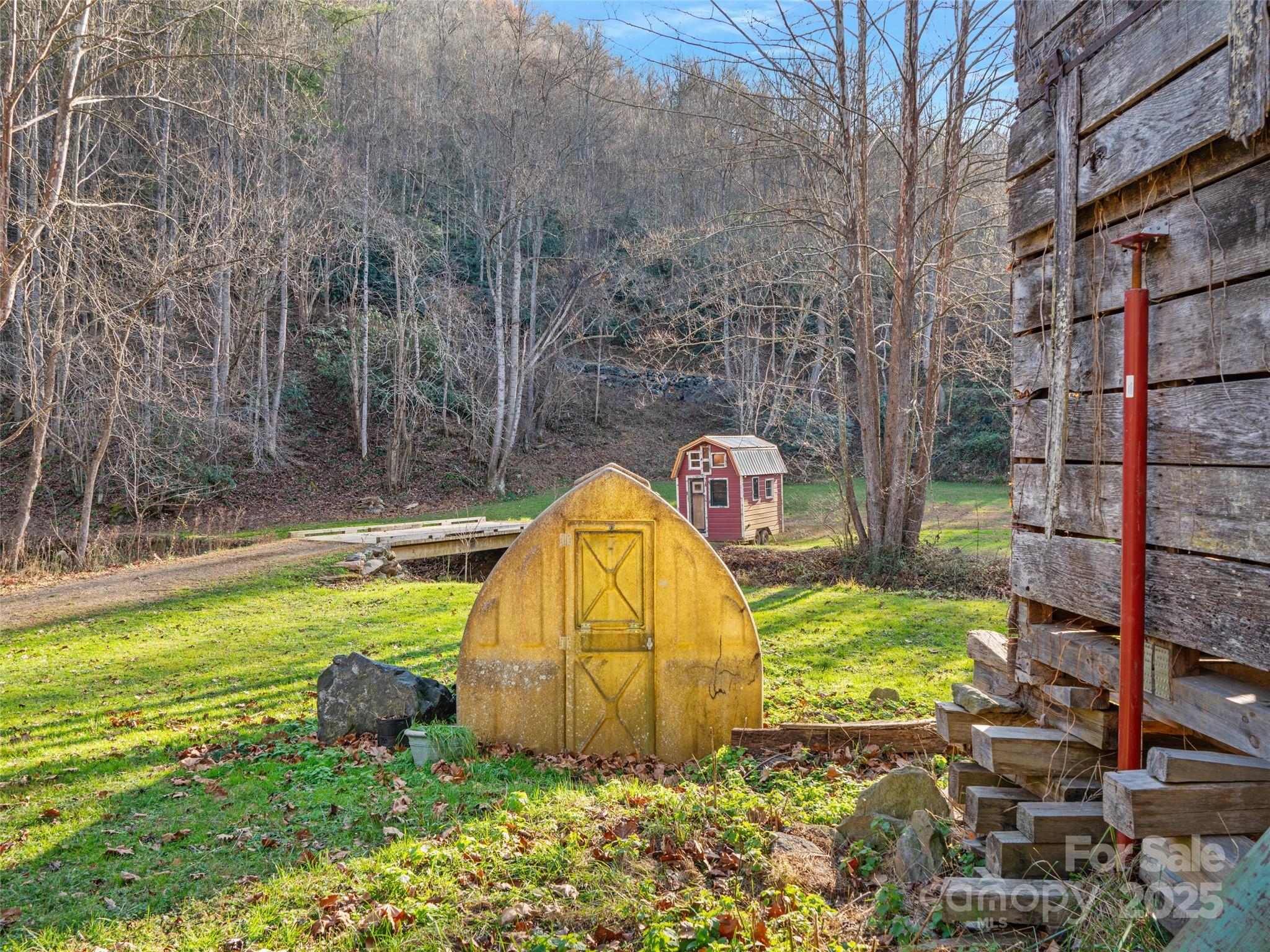 23 Katie's Road, Unit 145 95 ACRES Marshall, NC 28753 - Photo 39 of 48 a view of swimming pool with a backyard