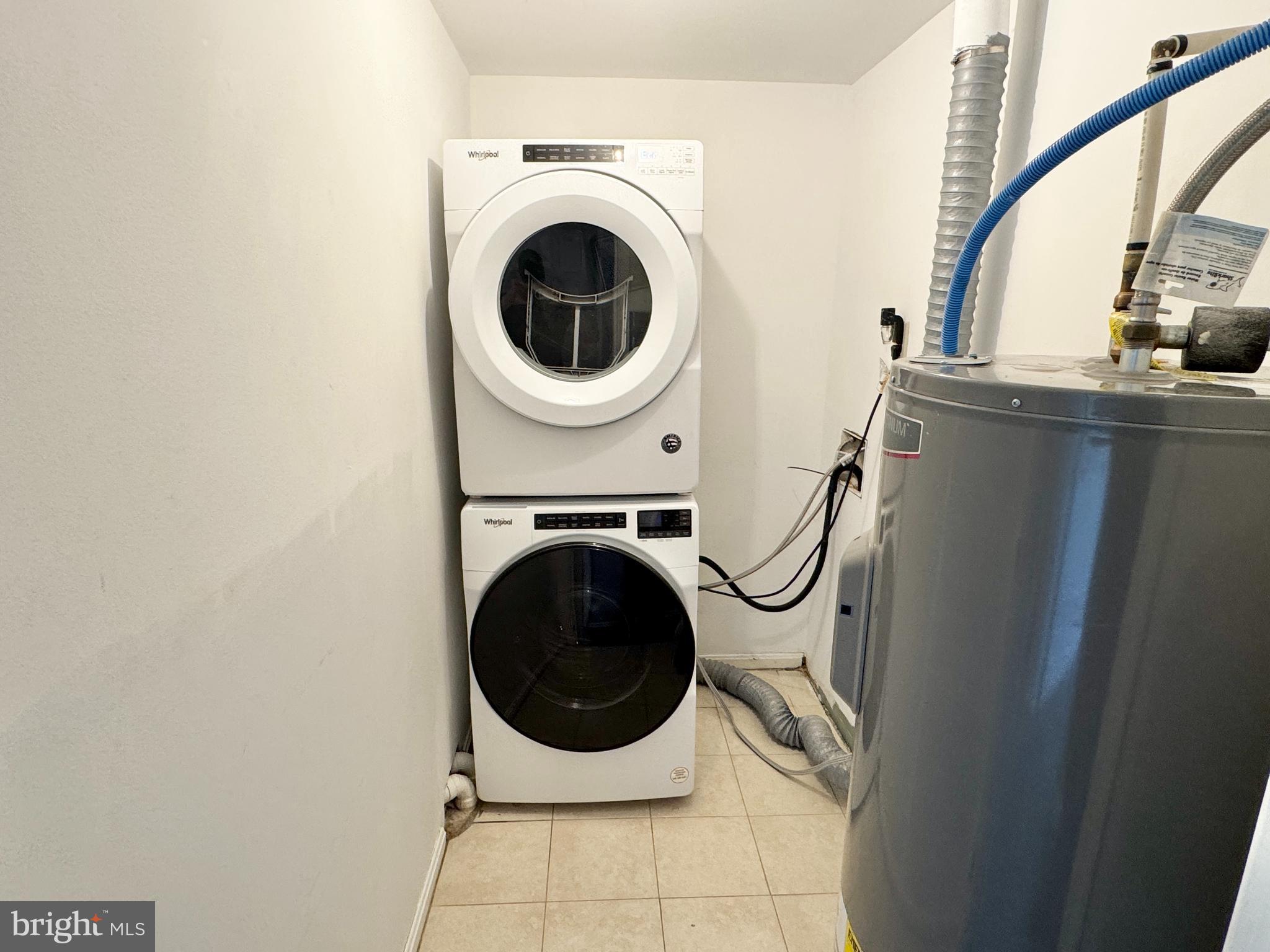 202 Dover Place, Unit 2 Stafford, VA 22556 - Photo 13 of 22 a utility room with sink dryer and washer